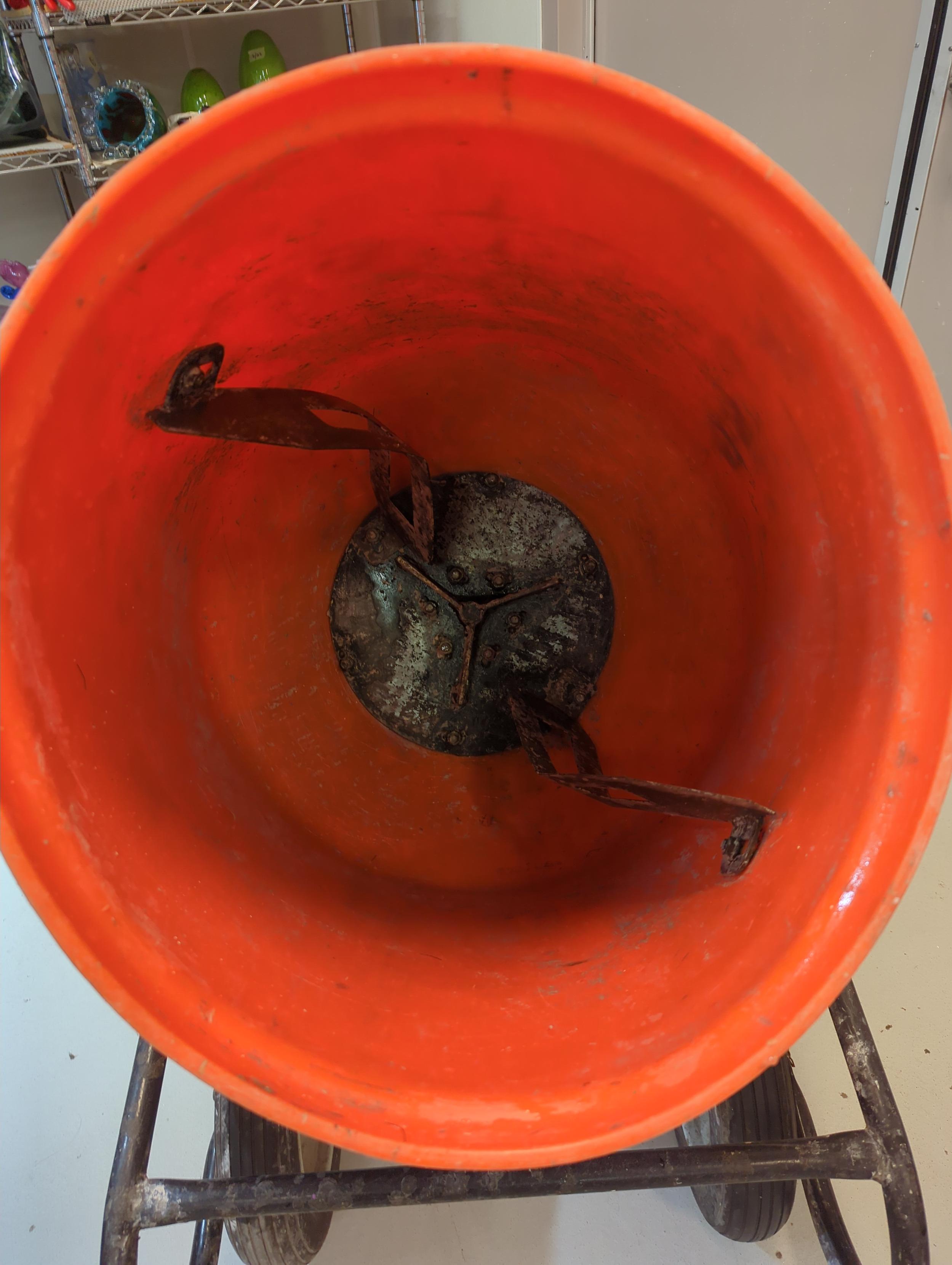 Cleaned orange cement mixer
